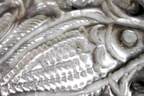 Closeup of fish engraved onto Vintage Antique Southeast Asian Silver Repoussé Cuff