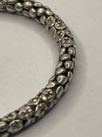 Closeup of side view of Balinese Popcorn Pebble Texture Silver Bracelet
