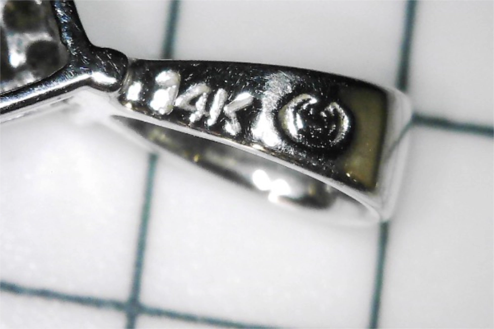 Hallmark of the Preowned 14K White Gold Classic Square Cluster Diamond Pendant with 14K etched