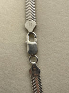 Closeup of the clasp of a Gently Preowned 925 Sterling Silver Flat Snake Herringbone Chain