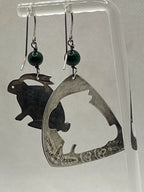 Preowned Sassi LaMuth Sterling Silver Rabbit Cut Out Earrings hanging on a rack