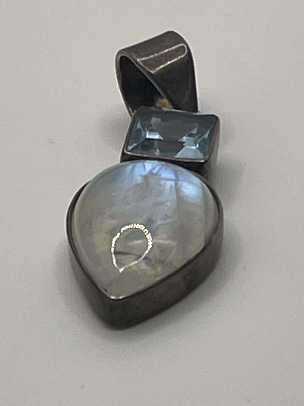 Blue Flash portion of the Preowned Sterling Silver Rainbow Moonstone Aquamarine Pendant