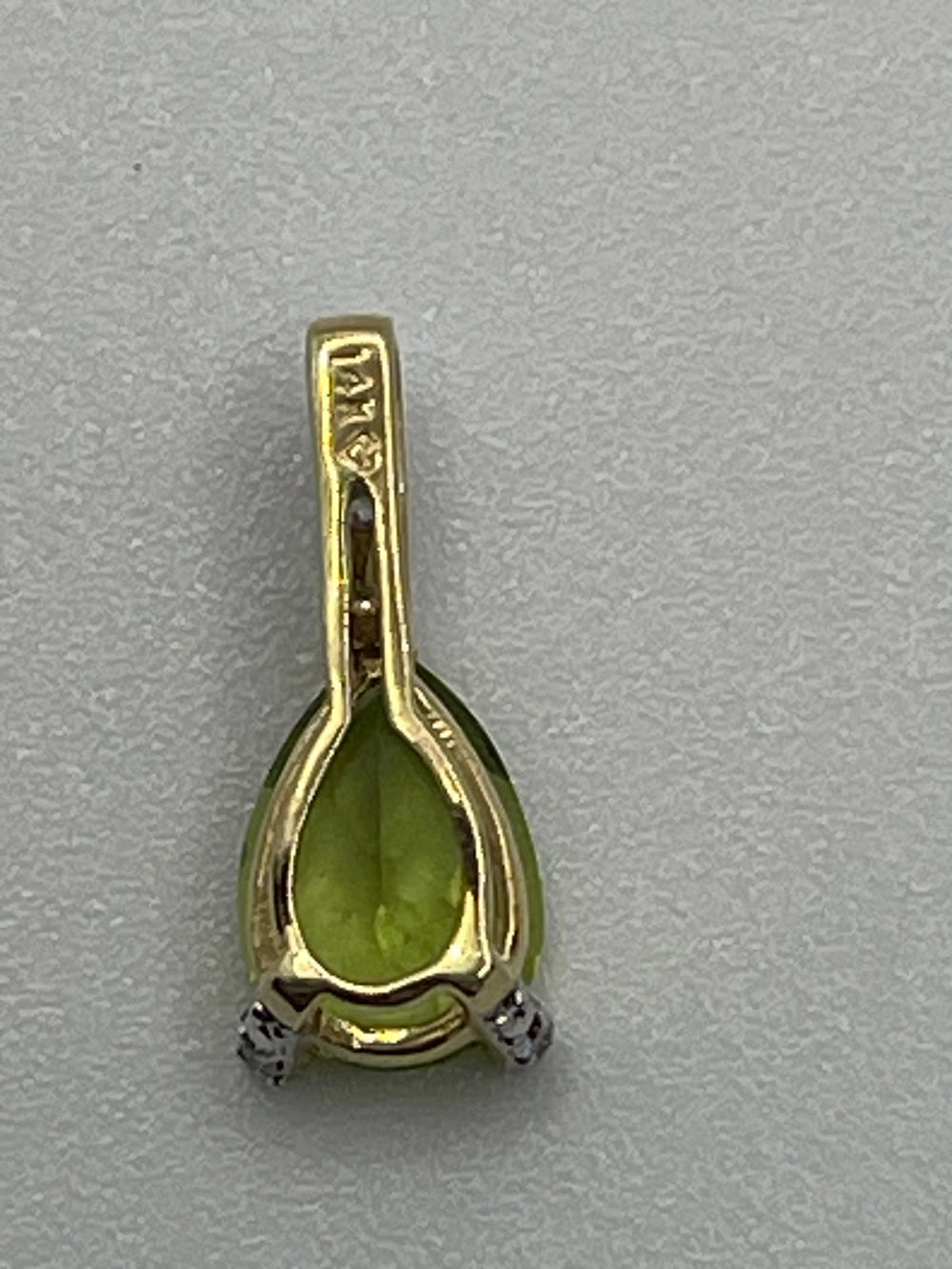 Back of the Preowned Stuller Pear Shaped Peridot Diamond 14k Gold Pendant
