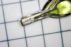 Hallmark of the Preowned Stuller Pear Shaped Peridot Diamond 14k Gold Pendant with 14K and a diamond icon etched