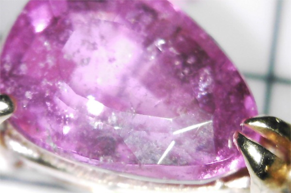 Macro view of the Preowned Vintage Natural Pink Teardrop Sapphire Diamond 14K Gold Pendant