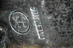Hallmark with Sterling engraved on the Signed Roy Talahaftewa Hopi Sterling Silver Overlay Bolo Tie