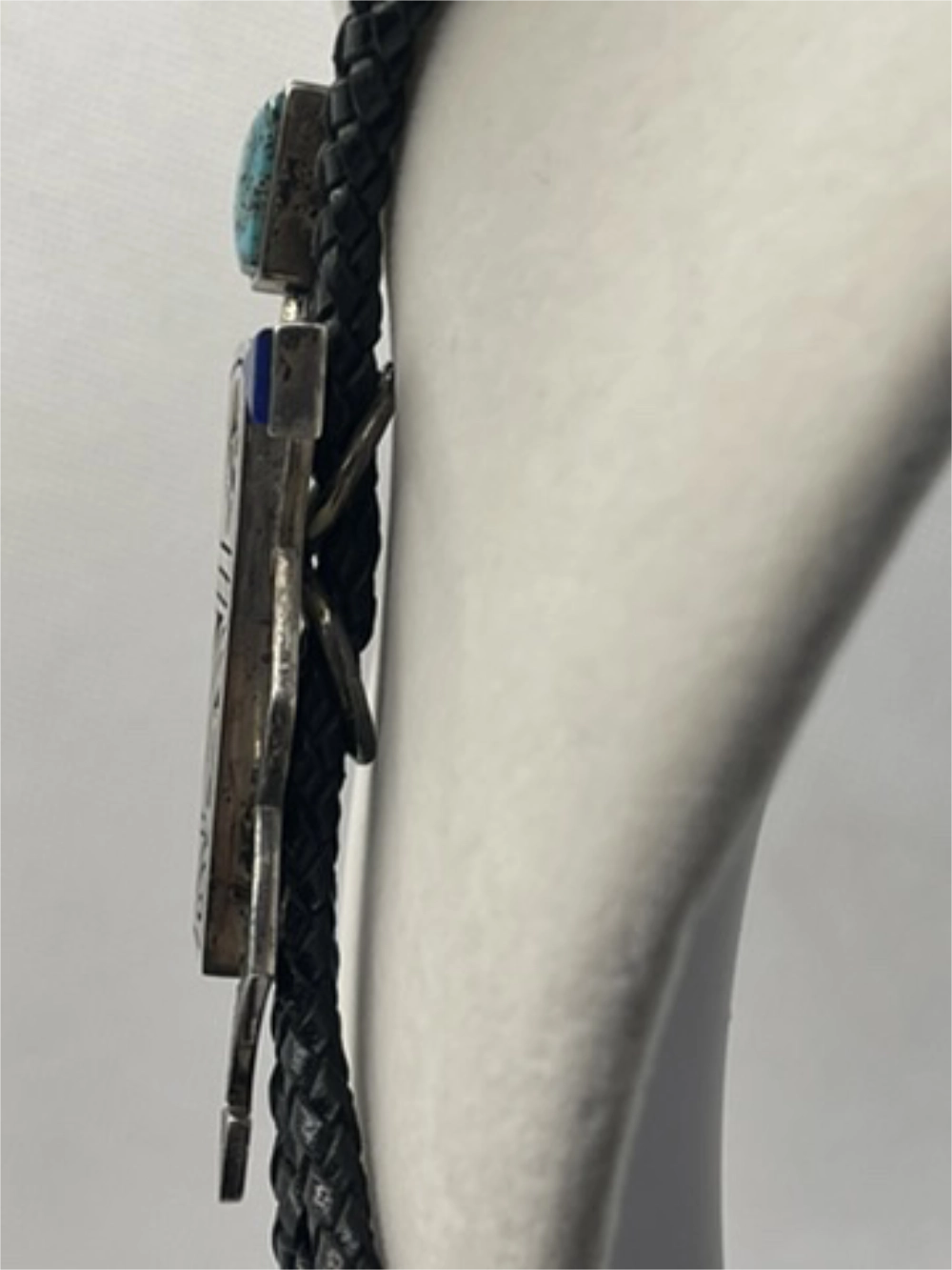 Right side of the Signed Roy Talahaftewa Hopi Sterling Silver Overlay Bolo Tie