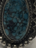 Closeup of the Tommy Jackson Vintage Navajo Black Web Turquoise Mens Sterling Silver Ring