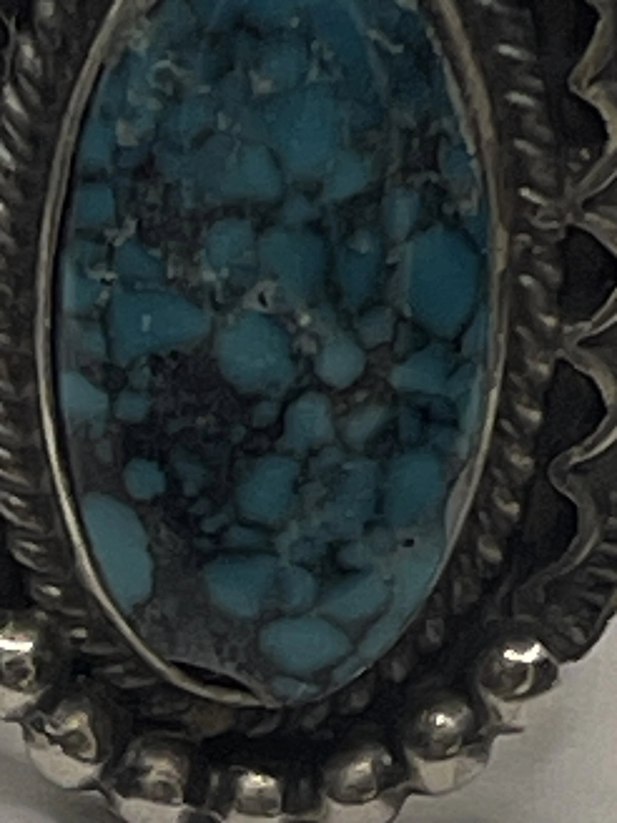 Closeup of the Tommy Jackson Vintage Navajo Black Web Turquoise Mens Sterling Silver Ring