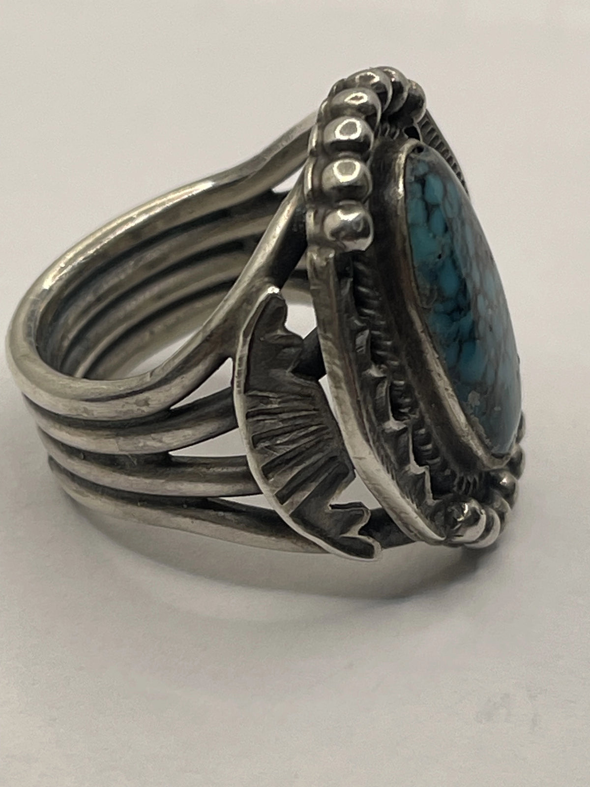 Left Side View of the Tommy Jackson Vintage Navajo Black Web Turquoise Mens Sterling Silver Ring