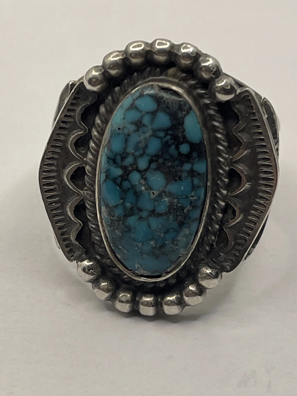 Front View of the Tommy Jackson Vintage Navajo Black Web Turquoise Mens Sterling Silver Ring