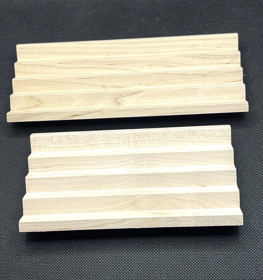 Two maple chevron hardwood soap racks side by side