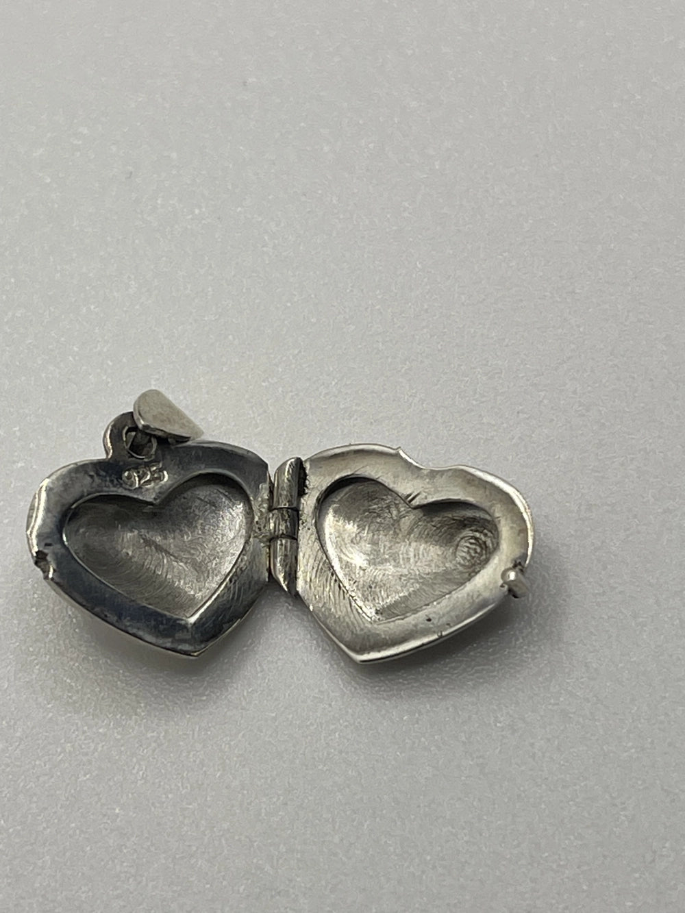 Inside view with Hallmark of the Vintage 925 Sterling Silver Heart Shaped Locket Pendant with 925 etched