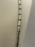 Closeup of a Vintage Southwestern Modernist Bench-Made Sterling Silver Linked Tube Chain Necklace 26"