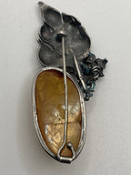 Back of the Vintage Baltic Honey Amber Silver Floral Brooch