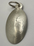 Back view of the Vintage Bishana Oval Sunburst Sterling Silver Pendant with Sterling etched
