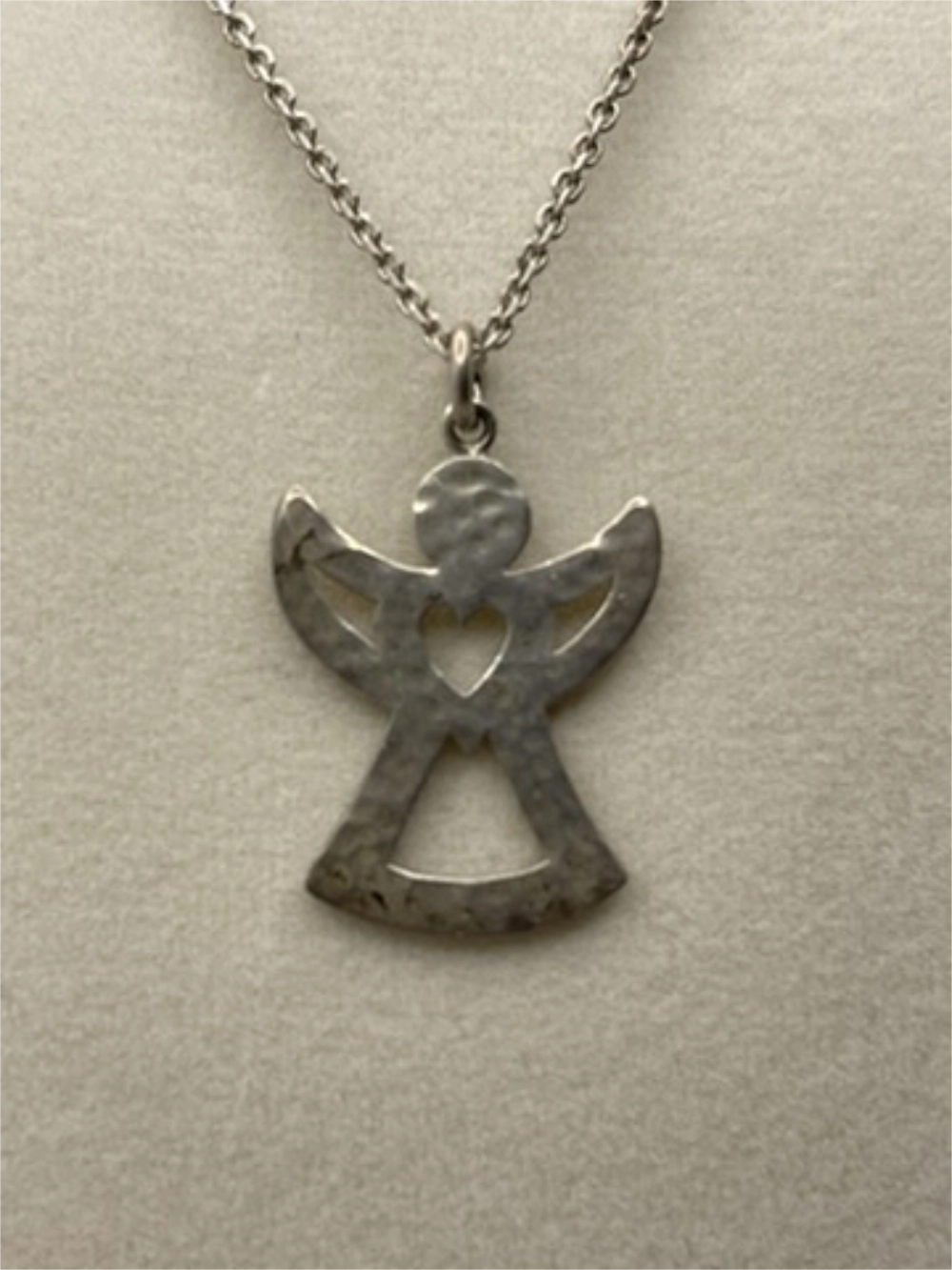 Closeup of the Vintage Carina F Made in Sweden Sterling Silver Angel Heart Pendant Necklace