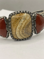 Angled closeup of Vintage Carolyn Pollack Brown Red Agate Sterling Silver Southwestern Style Cuff Bracelet