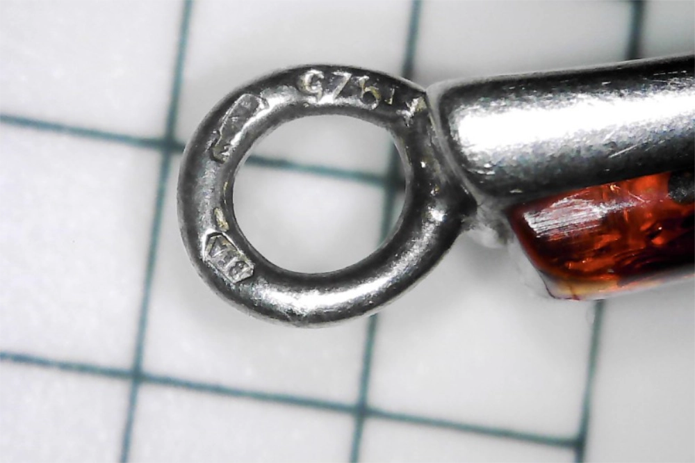 Closeup of latchb with 9Z5 etched into Vintage Genuine Baltic Amber Sterling Silver Link Chain Bracelet