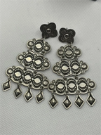 Flat view of the Vintage Harris Joe Sterling Silver Chandelier Repousse Earrings