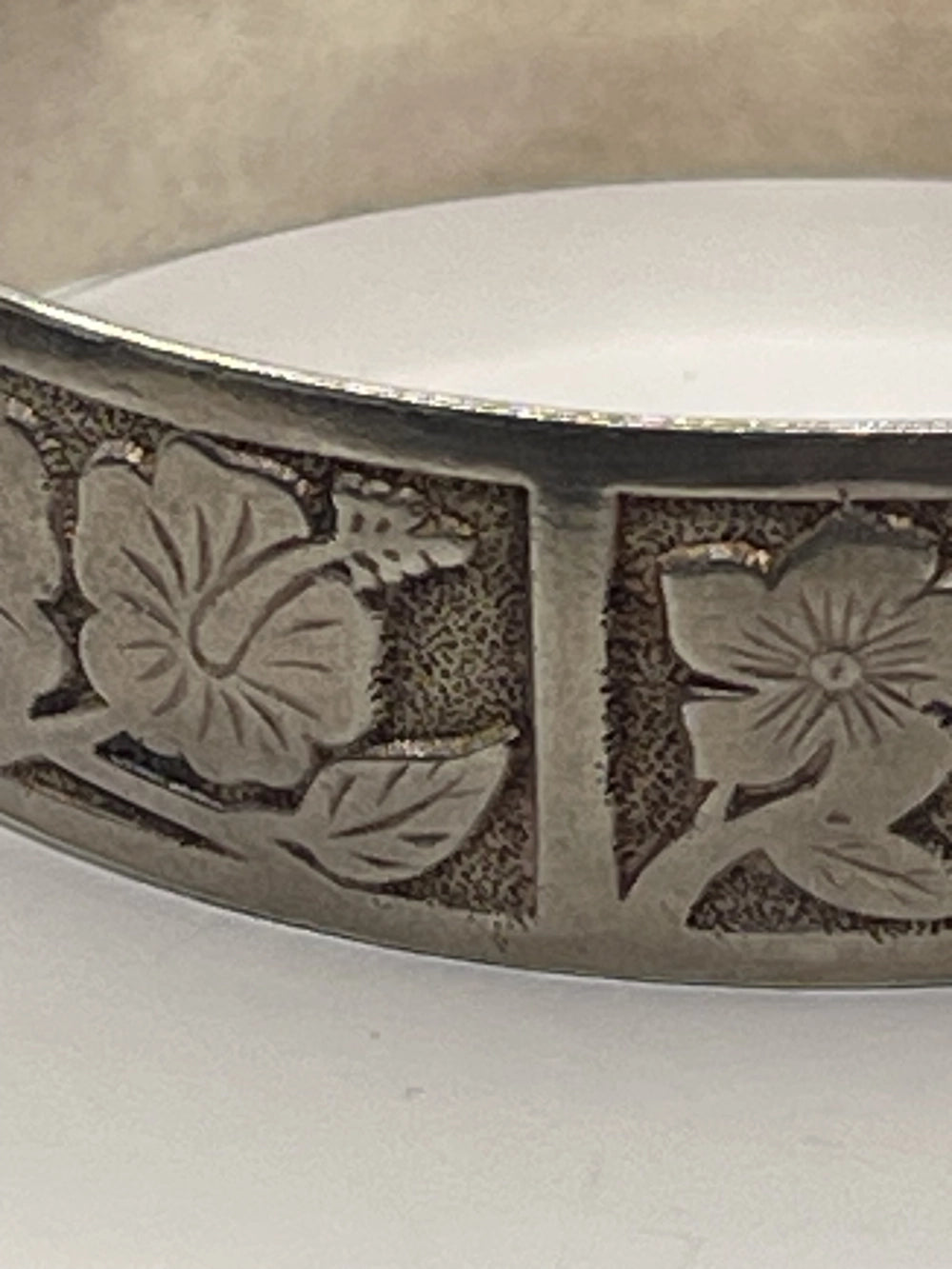 Closeup of floral designs from Vintage Kalakaua Gold 925 Silver Heirloom Bangle Bracelet