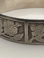 Closeup of floral designs from Vintage Kalakaua Gold 925 Silver Heirloom Bangle Bracelet