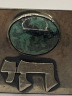 Closeup of one of the Vintage Hebrew Chai Life Sterling Silver Eilat Stone Cufflinks