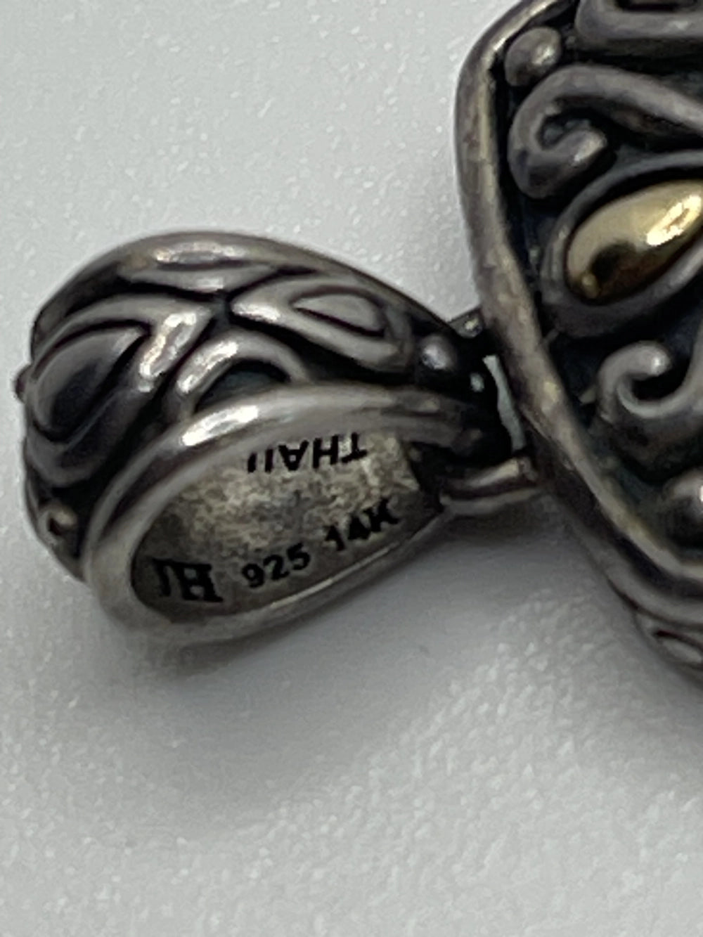 Hallmark of the Preowned Vintage Natural Pink Teardrop Sapphire Pendant with JH 925 14K Thailand etched
