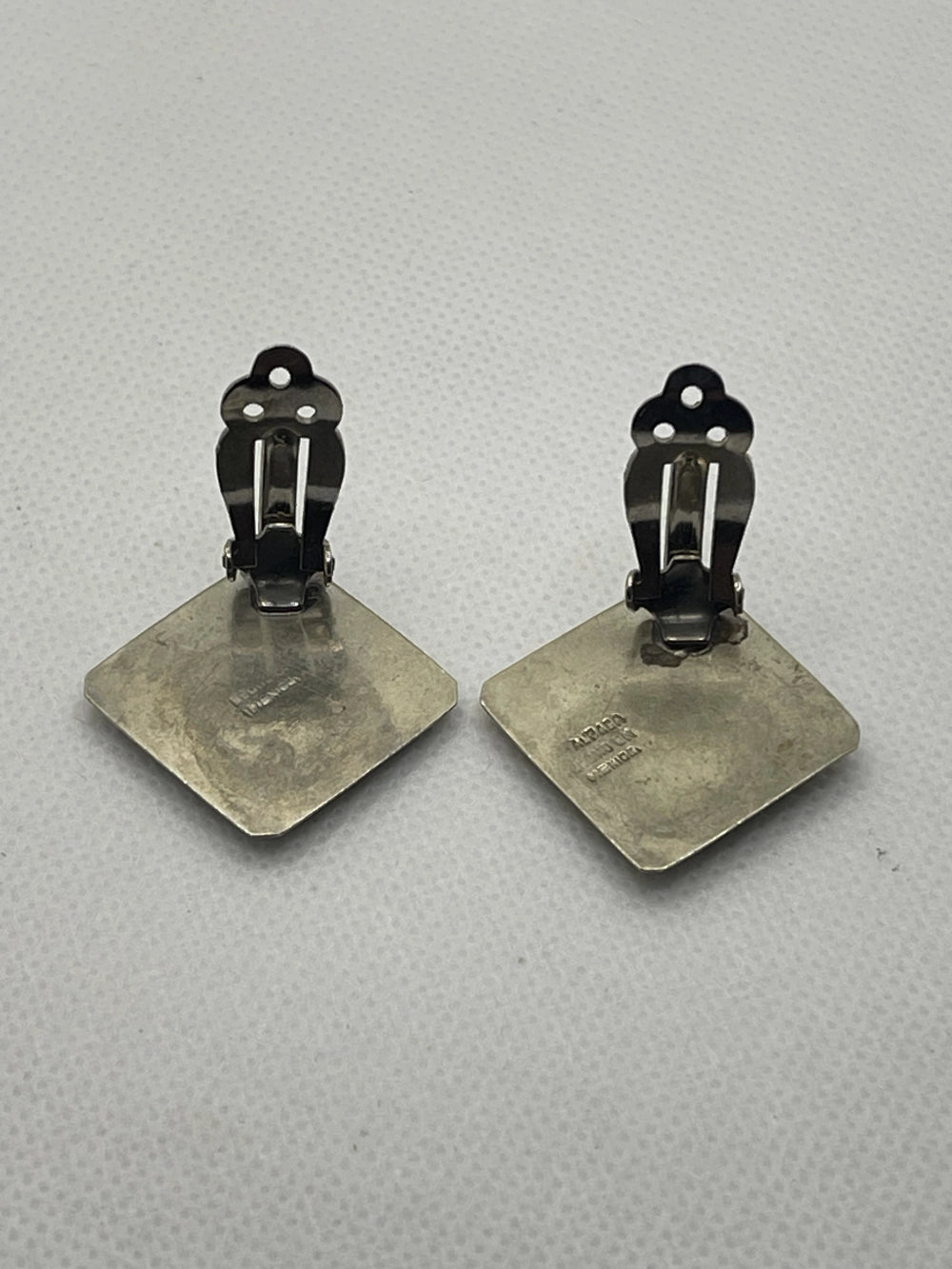Back View of Vintage Mexican Alpaca Silver Abalone Clip On Earrings