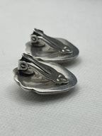Side view of the Vintage Taxco Mexico 925 Silver Shell Clip On Earrings