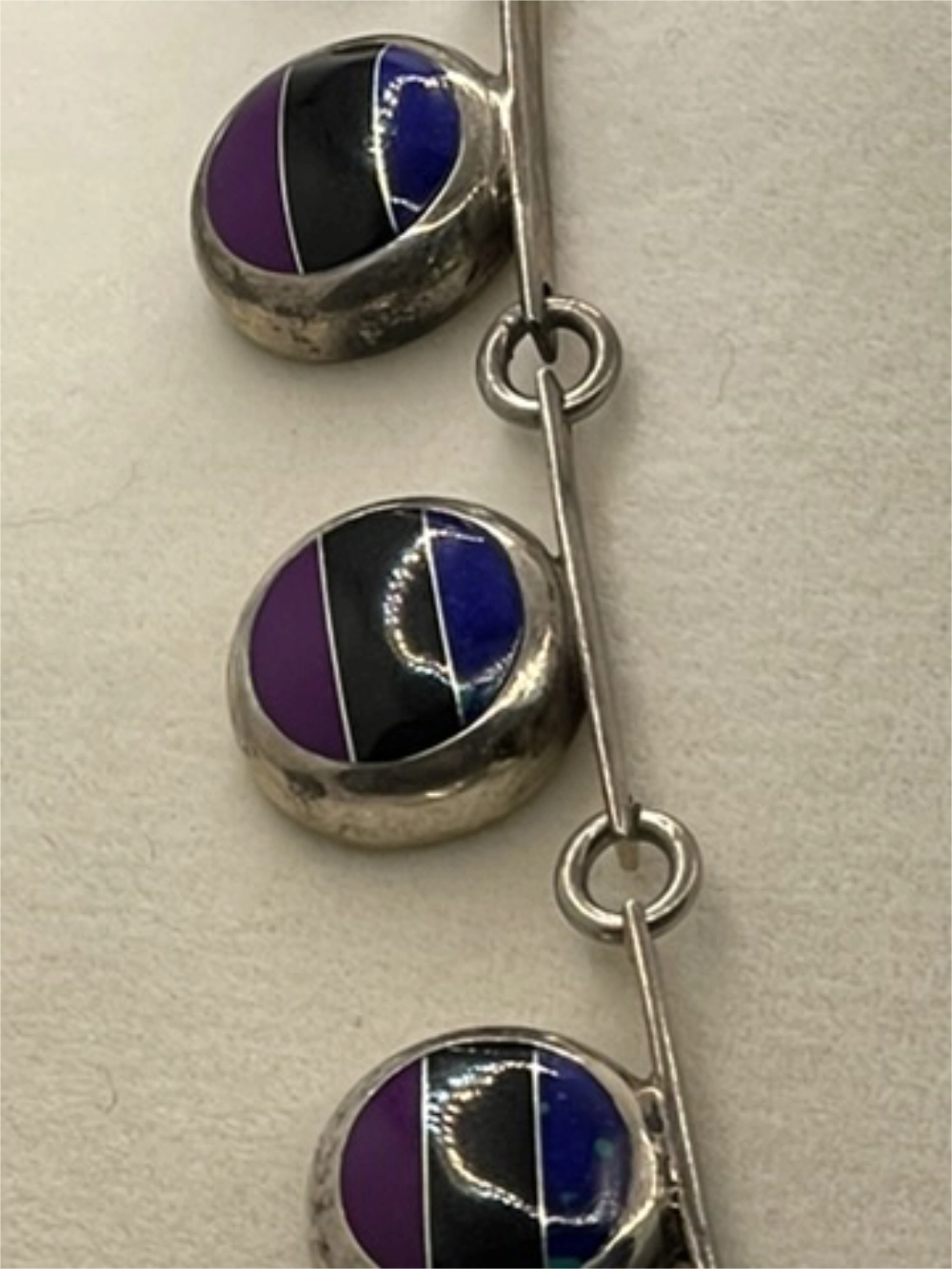 Closeup of stones of the Vintage Mexican Taxco Sterling Silver Inlay Link Necklace