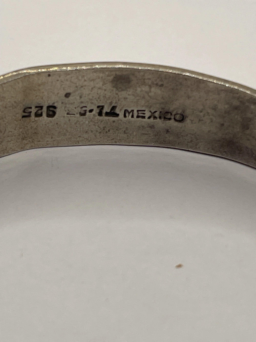 Closeup of Vintage Anthony Pineda 970 Sterling Silver Modernist Cuff Bracelet with TL5 S25 Mexico engraved