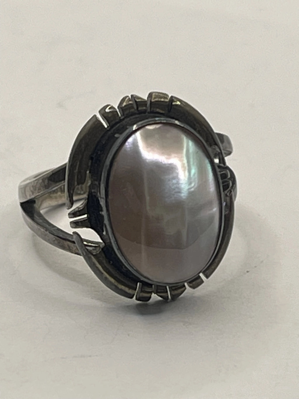 Left VIew of the Vintage NAKAI Sterling Silver Pink Mother of Pearl Navajo Ring