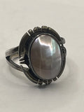 Left VIew of the Vintage NAKAI Sterling Silver Pink Mother of Pearl Navajo Ring