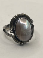 Left VIew of the Vintage NAKAI Sterling Silver Pink Mother of Pearl Navajo Ring