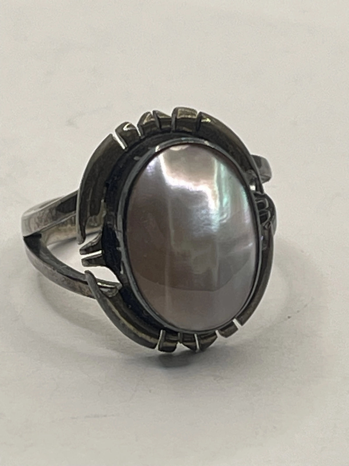 Left VIew of the Vintage NAKAI Sterling Silver Pink Mother of Pearl Navajo Ring