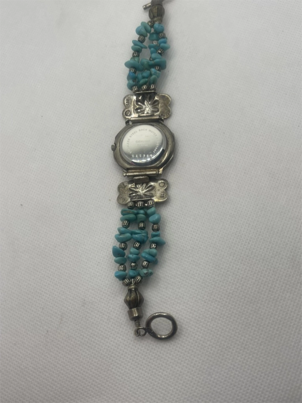 Back of Vintage Sedona Southwest Style Turquoise Bead Silver Watch with Stainless Steel Genuine Stone 330786 etched