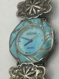 Closeup of front of Vintage Sedona Southwest Style Turquoise Bead Silver Watch