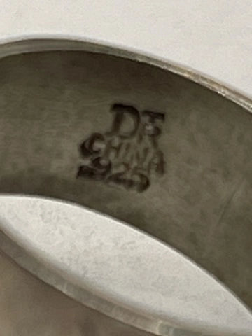 Closeup of Vintage Signed 925 DTR Jay King Desert Rose Trading Deep Purple Stone Sterling Modernist Ring