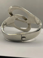 Back view of Vintage Genuine Alicia de la Paz Modernist Interlocking Silver Bangle Bracelet