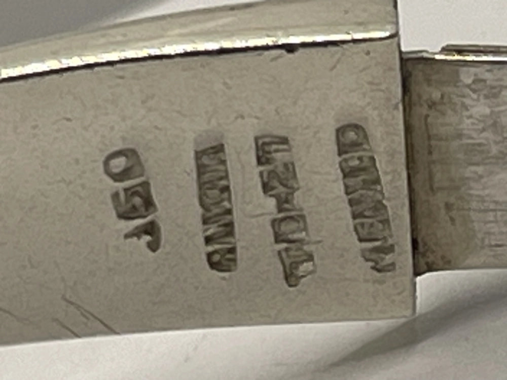 J50 Mexico engraved on side of Vintage Genuine Alicia de la Paz Modernist Interlocking Silver Bangle Bracelet