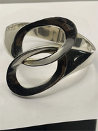 Closeup of links of Vintage Genuine Alicia de la Paz Modernist Interlocking Silver Bangle Bracelet