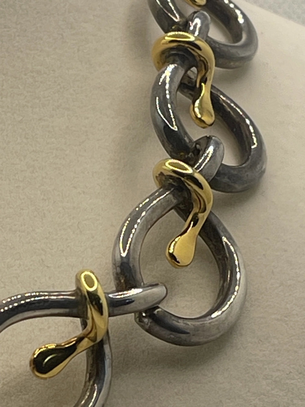 Closeup of the chains of a Vintage Two-Tone Sterling Silver Gold Vermeil Stylized Snake Collar Necklace
