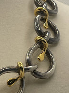 Closeup of the chains of a Vintage Two-Tone Sterling Silver Gold Vermeil Stylized Snake Collar Necklace