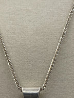Closeup of Vintage 925 Taxco Mexican Modernist Cushion Cut Black Onyx Pendant Necklace