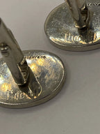 Closeup of back of Vintage  Oval Sterling Silver Cufflinks with Tiffany & Co. etched in the back.