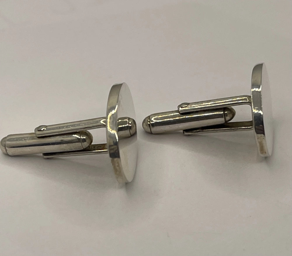 Left side view of Vintage Tiffany & Co. Oval Sterling Silver Cufflinks