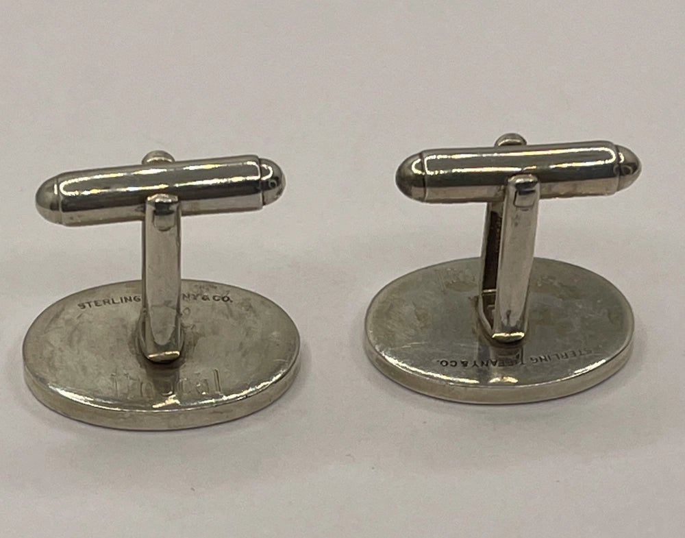 Top view of Vintage Oval Sterling Silver Cufflinks with Sterling Tiffany & Co. etchded into the back.