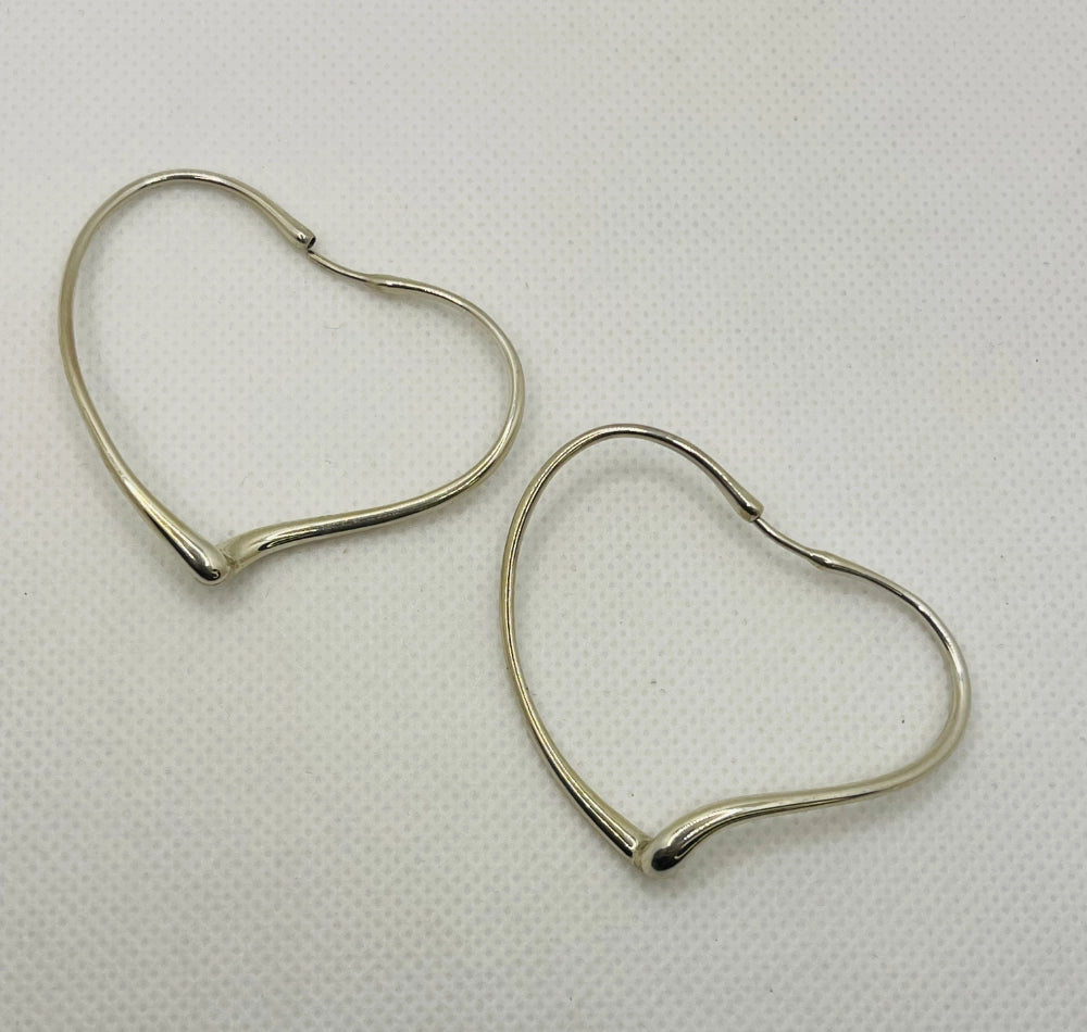 Flat view of the Vintage Tiffany & Co. Elsa Peretti Open Heart Collection Earrings