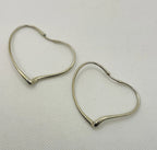 Flat view of the Vintage Tiffany & Co. Elsa Peretti Open Heart Collection Earrings